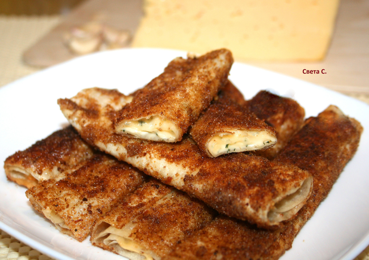 Нежные рулетики из лаваша с сыром: вкусный завтрак за 30 минут